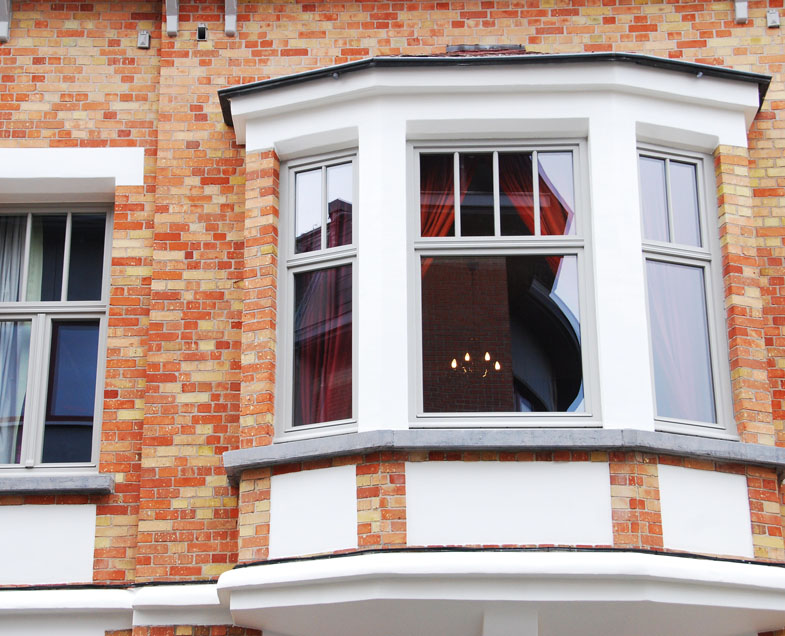 Menuiserie-Riche-fenetres-petits-bois-colles-loggia-impostes-renovation-menuiserie-riche.jpg